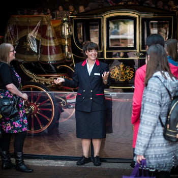 Warden with a group of visitors