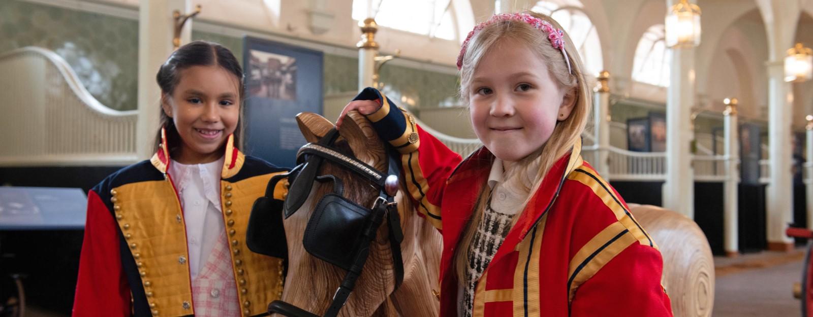 Children visiting the Royal Mews